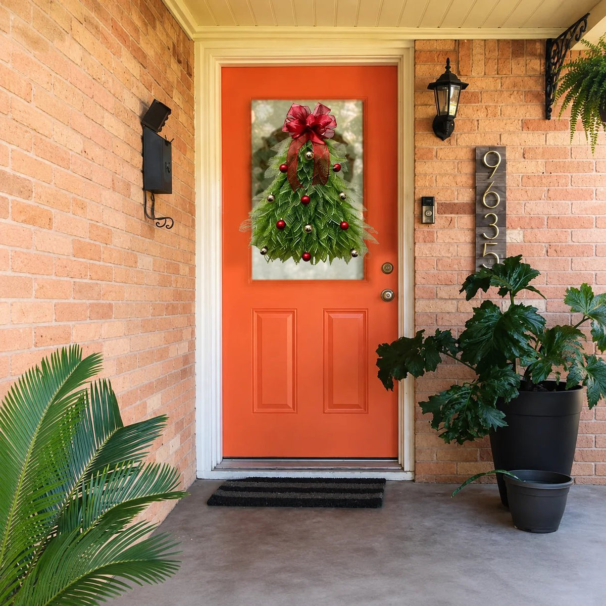 Christmas tree wreath decorating a front door